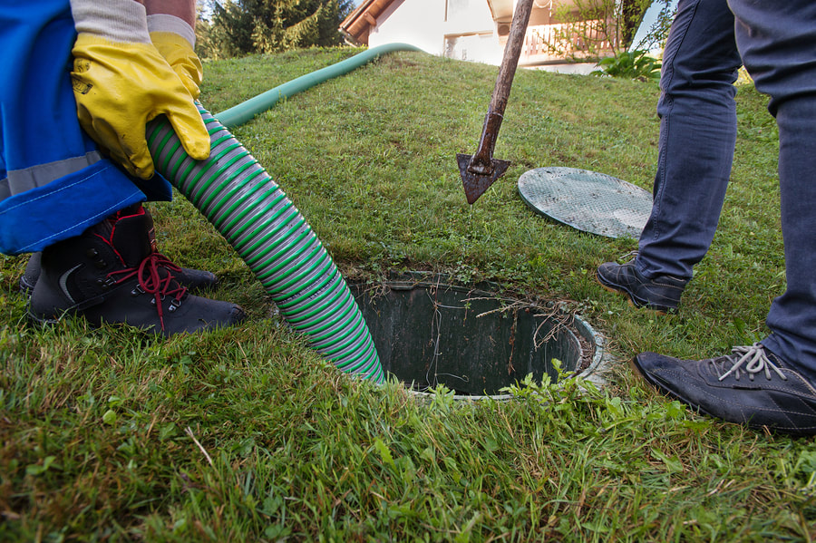 man doing septic inspections
